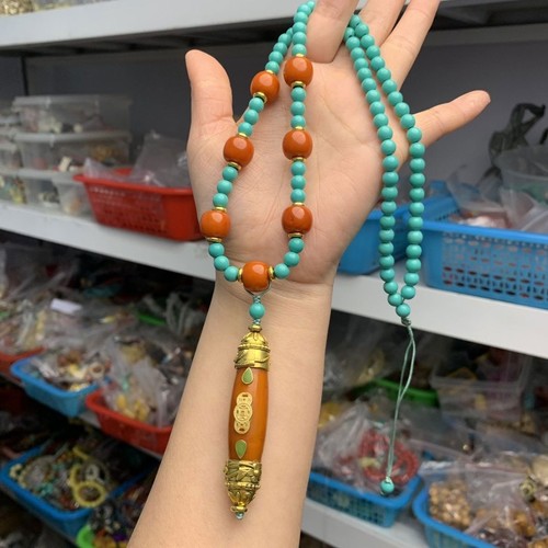 Collana con ciondolo tibetano
