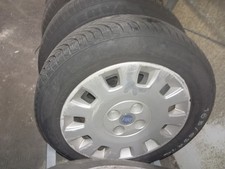4 cerchi in ferro con gomme invernali + coppe originali per: Panda II serie/Punt