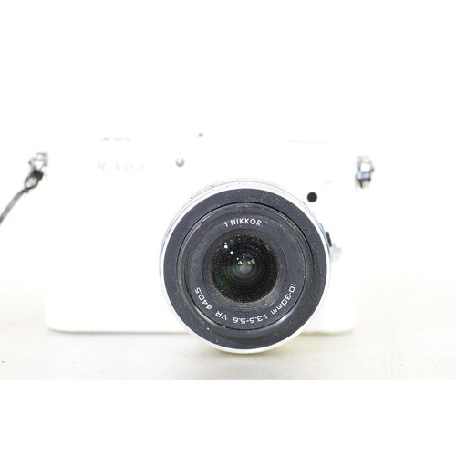 Fotocamera nikon con - v1,
