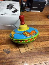 Giocattolo trottola colorata vintage con disegno animale