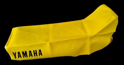 Housse selle jaune neuve - de,