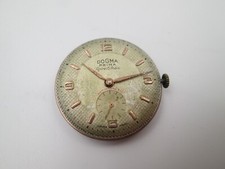 Máquina y esfera reloj de