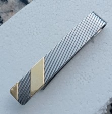 Fermacravatta Fermasoldi in silver con due inserti in oro 750