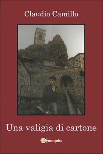 Una valigia cartone - una,