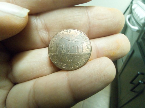 One cent penny - one,