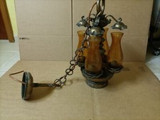 Lampadario Vintage in ferro battuto con 4 ampolle di vetro