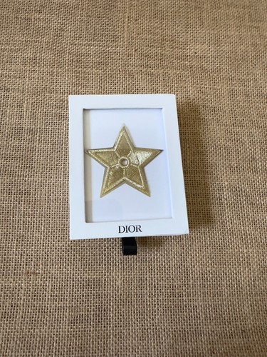 Pin broche dior étoile - pin's,