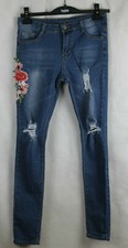 Jeans Strappati Con Ricamo