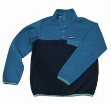 Pullover in pile con bottoni a