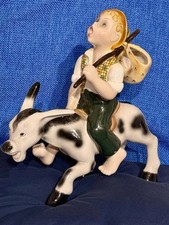 Ceramica firmata Cia Manna Torino, bimbo su asinello