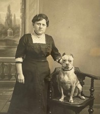1900s Woman posing w Pit Bull