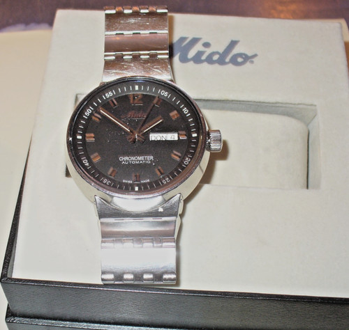 Top mido all dial - top,