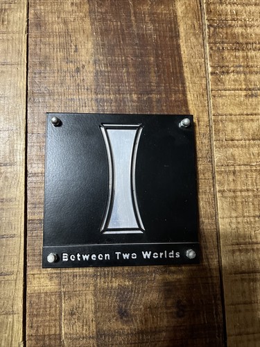 Between two worlds - -, ed