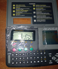 AGENDA GAME MULINO BIANCO CON VIDEOGIOCO GRAND PRIX - DA RIPARARE VANO BATTERIA