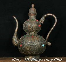 Teiera vino testa drago bestia