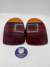 PLASTICHE FANALI POSTERIORI VOLKSWAGEN MAGGIOLINO HELLA USATE UNA SCHEGGIATA