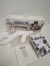 RESIDENT EVIL THE DARKSIDE CHRONICLES + WII ZAPPER GUN PACK GIOCO NINTENDO WII