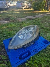 Faro proiettore anteriore SX