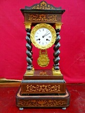 Orologio impero in legno