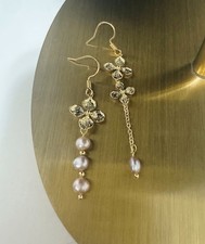 Orecchini asimmetrici in