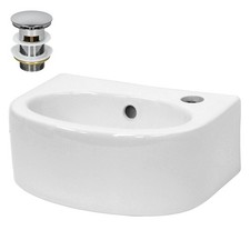 Lavabo in ceramica con set di