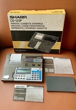 Calcolatrice Sharp PC-1270 e interfaccia stampante CE-123P vintage