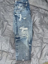 jeans strappati