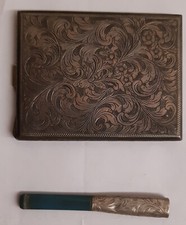 Portasigarette con bocchino vintage in argento 800. Dimensioni 9,5 x7,5 x 0,6 cm