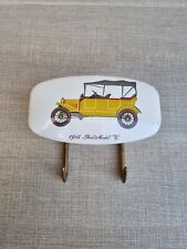 Attacca panni auto epoca