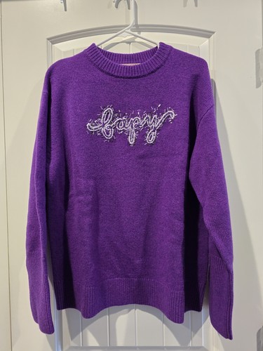 Maglione nuovo con etichette