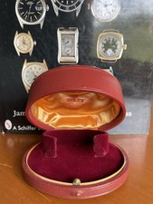 Scatola Rolex anni ‘50 / ‘60 a forma conchiglia bordeaux. Vintage Clam shell box