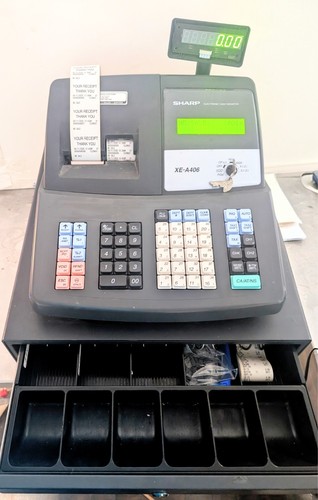 Registratore cassa - di,