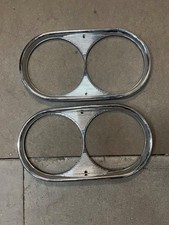 FIAT 1300 1500 COPPIA CORNICI FARI IN ZAMA  HEADLIGHT FRAMES OLD STOCK