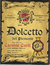 Gattinara. Etichetta vino DOLCETTO DEL PIEMONTE, Cantine CURTI. Retro abraso