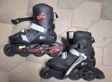 Pattini in linea regolabili Oxelo 36-38 neri con protezioni