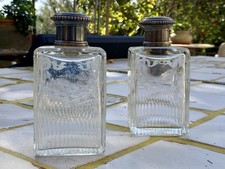 COPPIA DI ANTICHE BOTTIGLIE IN CRISTALLO BACCARAT CON TAPPI IN ARGENTO