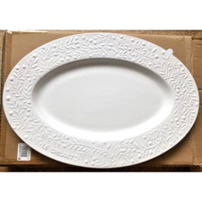 Piatto ovale in rilievo ramo