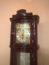 Antico orologio a pendolo da