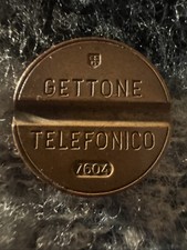 Gettone telefonico 7604 in