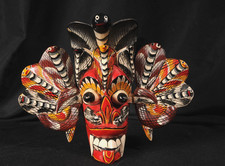 Maschera da parete in legno