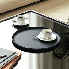 Vassoio tondo ALESSI Pleats in varie misure in acciaio lucido o colorato nero.