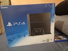 Sony PlayStation 4 Console - 500 GB GO Jet Black + Vari Giochi + Joystick