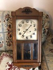 Splendido orologio da parete antico con pendolo e chiave ricarica 