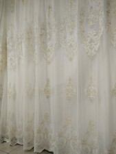 tendaggio a metro tulle