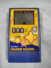 RARO GIOCO ELETTRONICO PORTATILE VINTAGE 1984 CASIO CG-86 SOLDATINO COMBATTENTE JAPAN