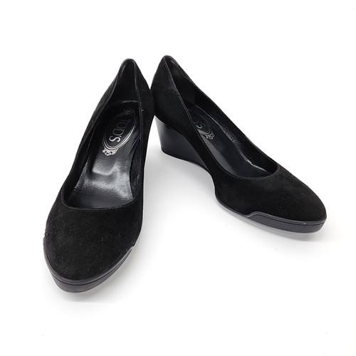 Scarpe con zeppa selvaggia