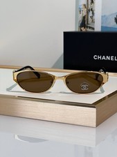 Occhiali da sole Chanel CC oro