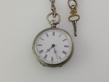 Antico Orologio da taschino in argento con carica a chiave 