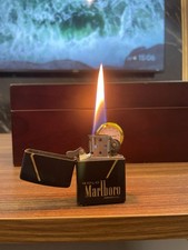 Raro accendino Zippo Marlboro ottone e nero 2013 made USA
