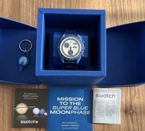 Swatch omega mission the - mission,
